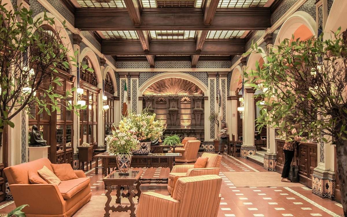 pinks and greens in luxury hotel lobby