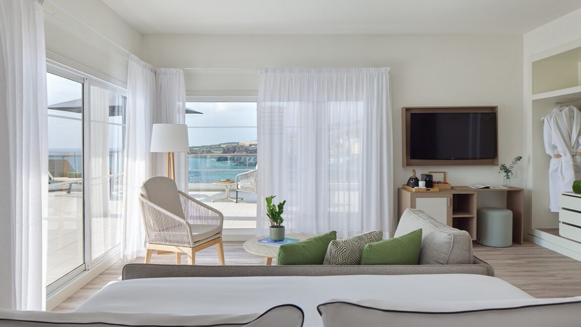 guestroom in Melia La Palma in shades of white and cream with dual aspect sea views