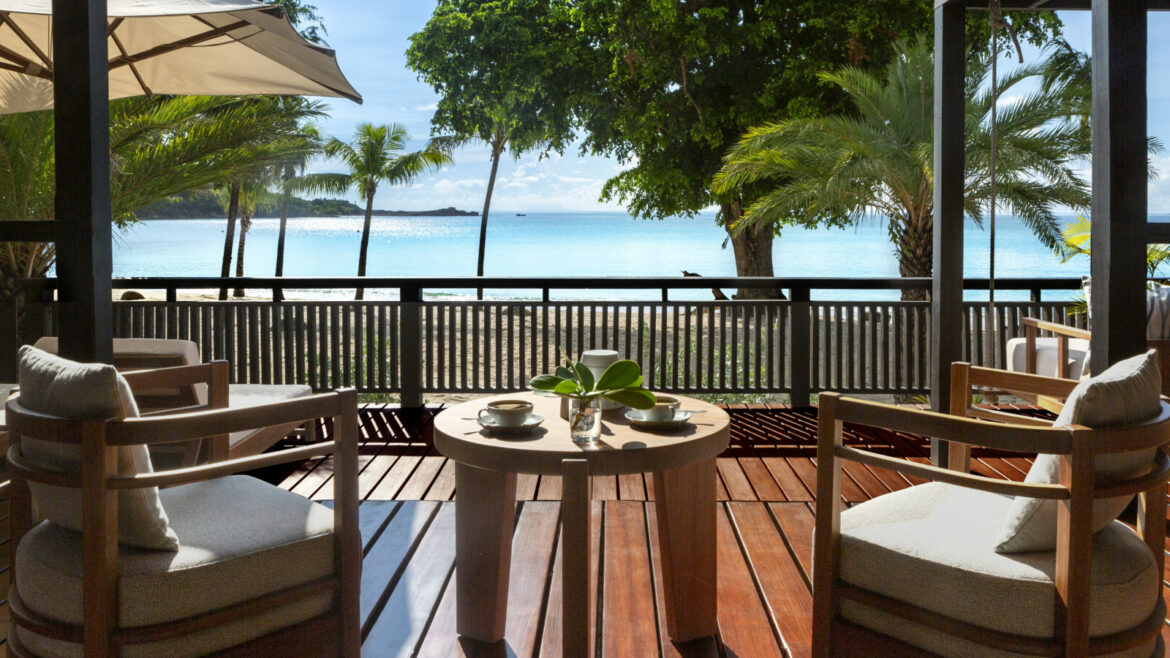 Crystal waters of Antiguan sea, viewed from beachside guestroom deck