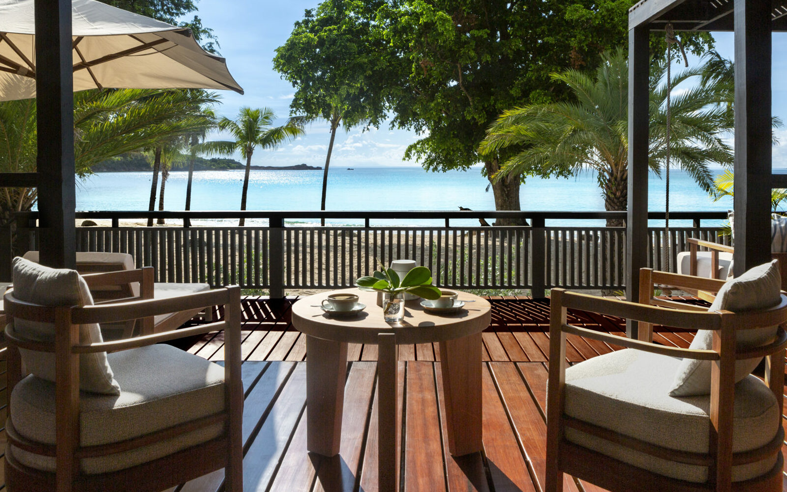 Crystal waters of Antiguan sea, viewed from beachside guestroom deck