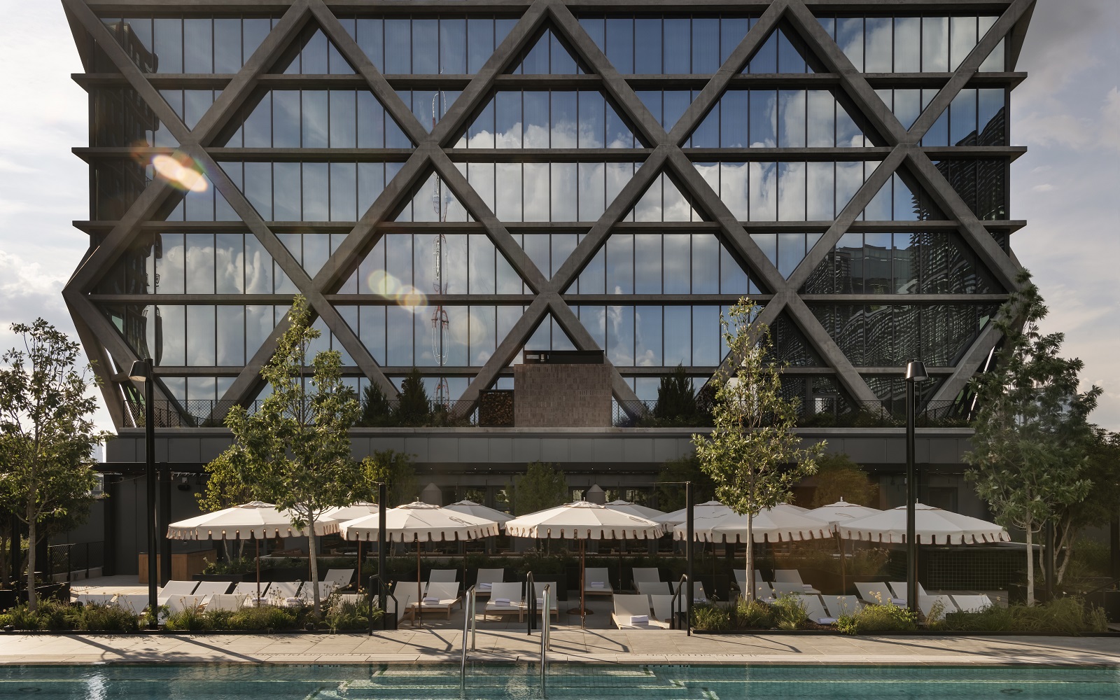 view of façade of Forth Atlanta across swimming pool