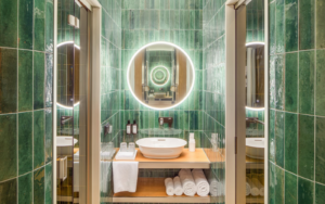 green tiled bathroom in the Kimpton BEM Budapest