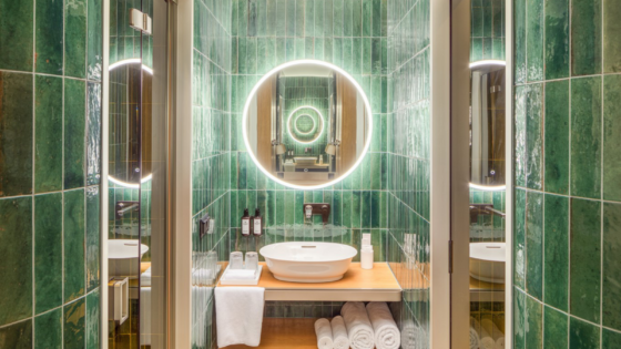 green tiled bathroom in the Kimpton BEM Budapest