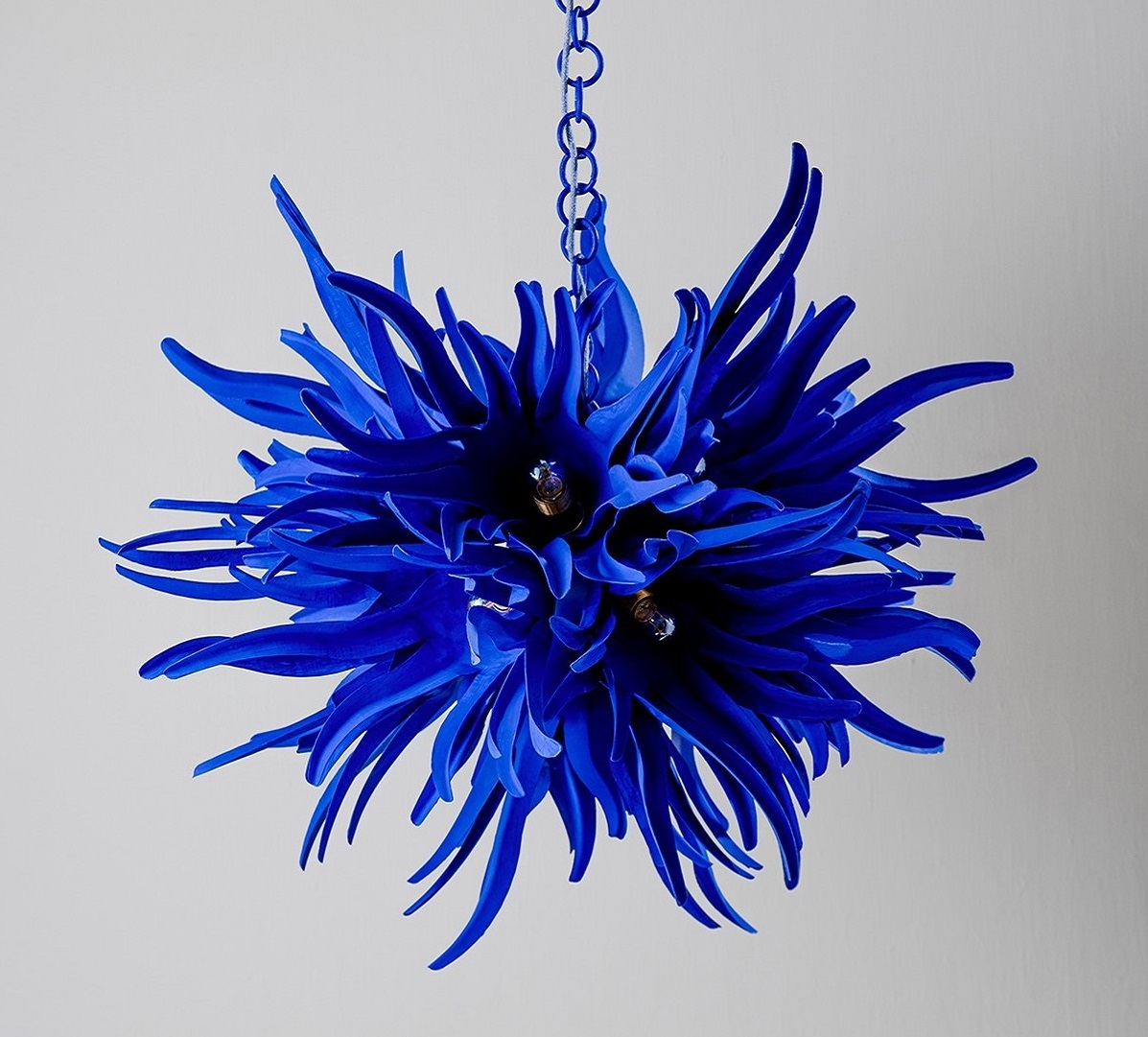 The Urchin is an electric blue chandelier inspired by the Turkish hazel seed pod