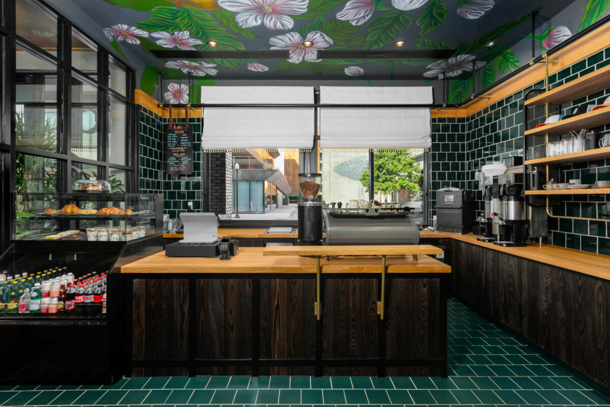 Motto by Hilton Downtown Bentonville: Coffee bar with green floral ceiling and green tile floor