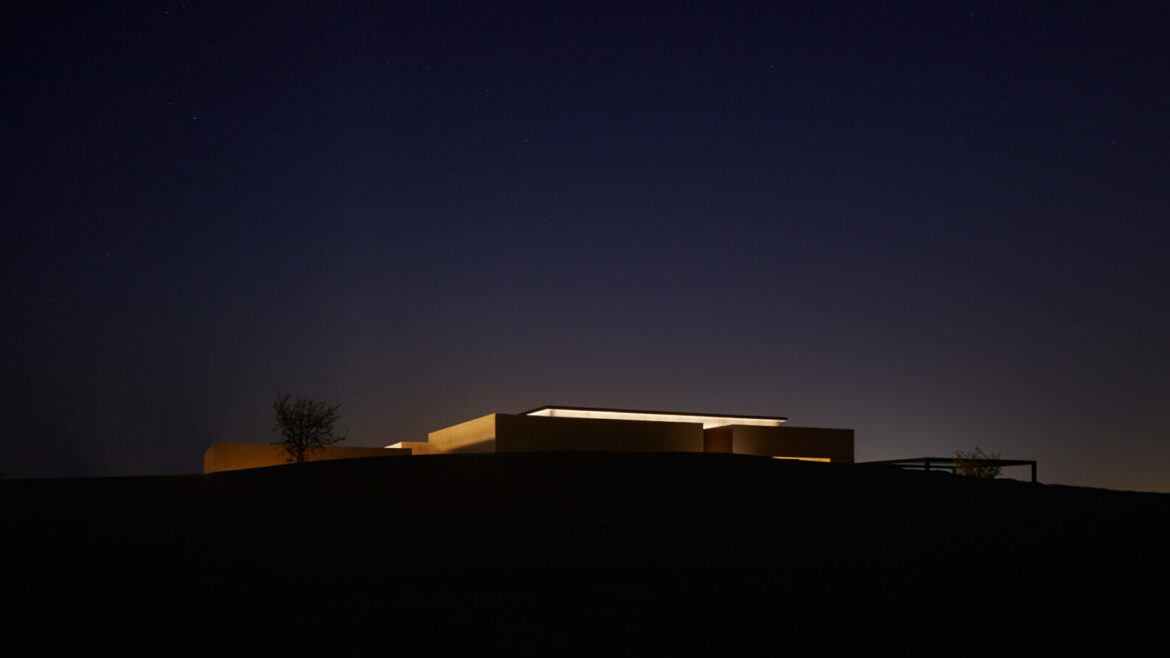 Distant shot of H+A architecture studio's Ritz Carlton desert villa - taken at night