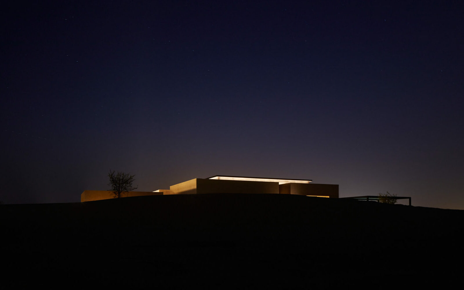 Distant shot of H+A architecture studio's Ritz Carlton desert villa - taken at night