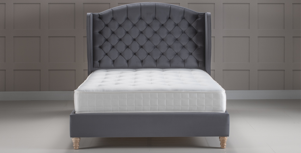 Mattison Contract Bed with grey buttoned headboard