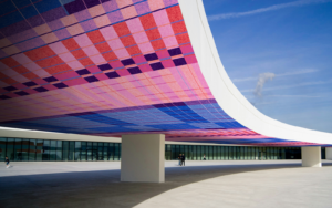 render of arched architectural structure with modieus carpet pattern on surface