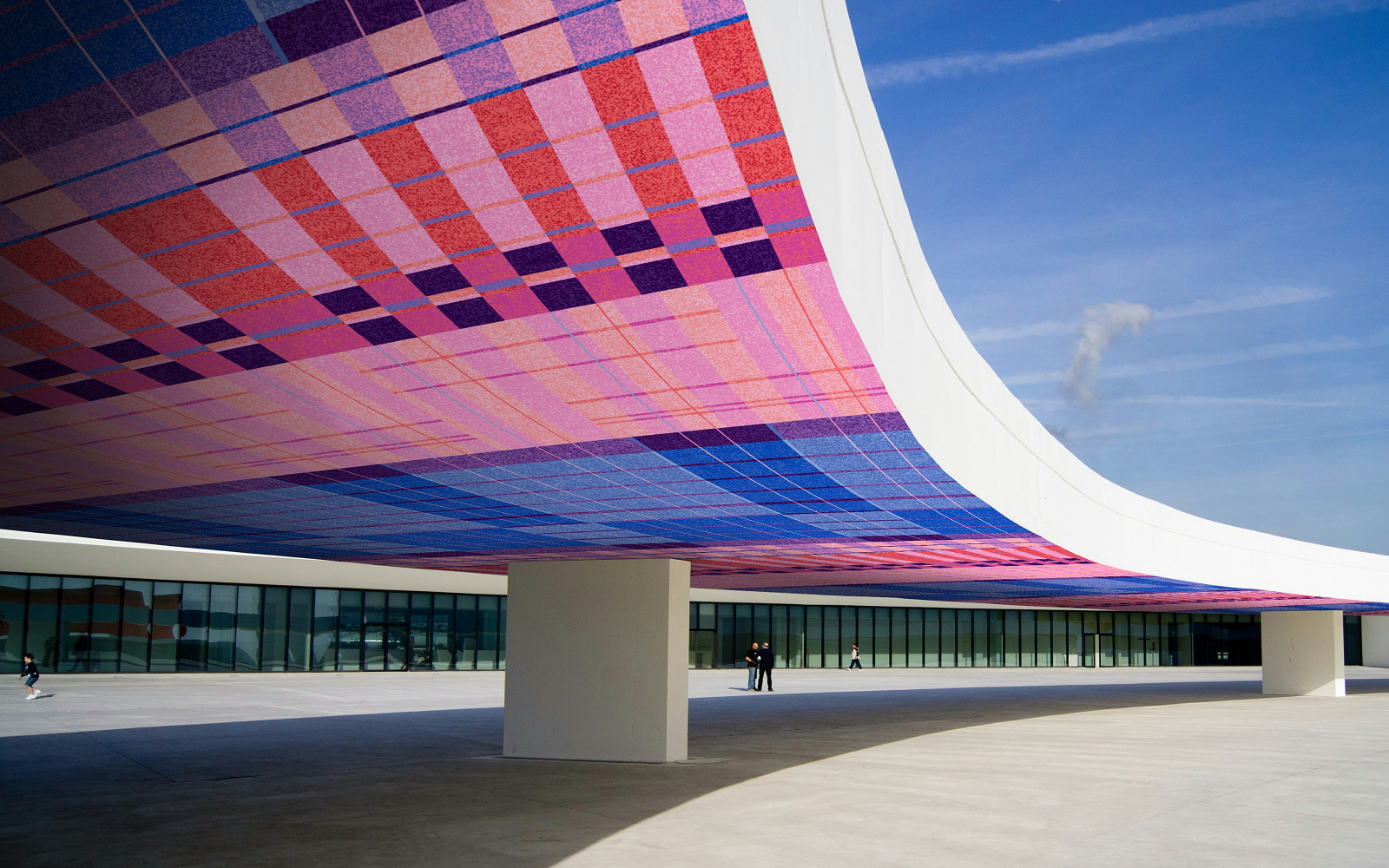 render of arched architectural structure with modieus carpet pattern on surface