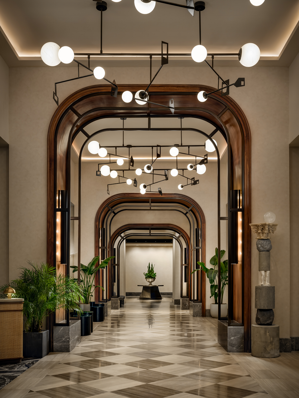 series of arches with statement lighting leading into sofitel Philadelphia