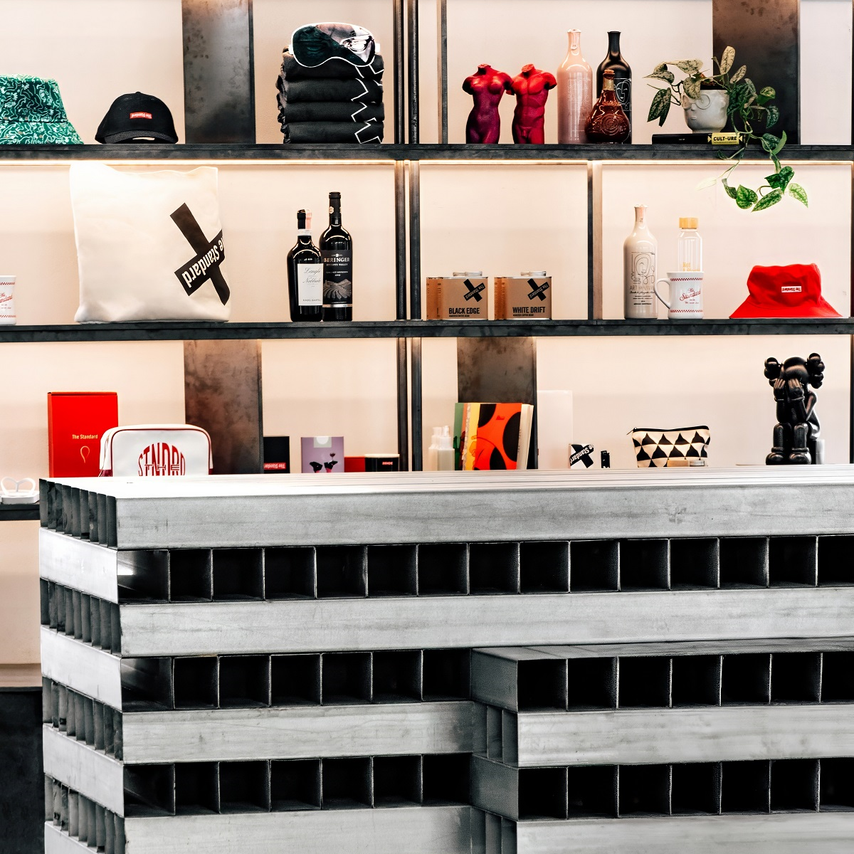 black and white tiled bar with shelving behind