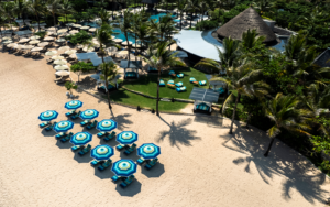 Missoni and Ritz Carlton Beach pop up collaboration with missoni parasols on the beach