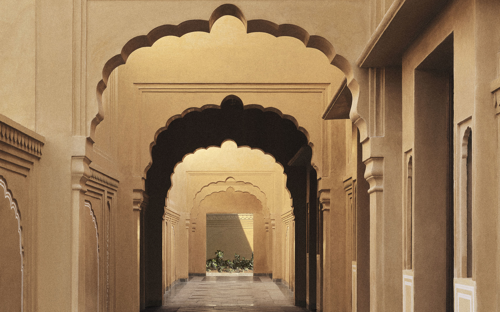 arches leading into The Taj Sawai Man Mahal