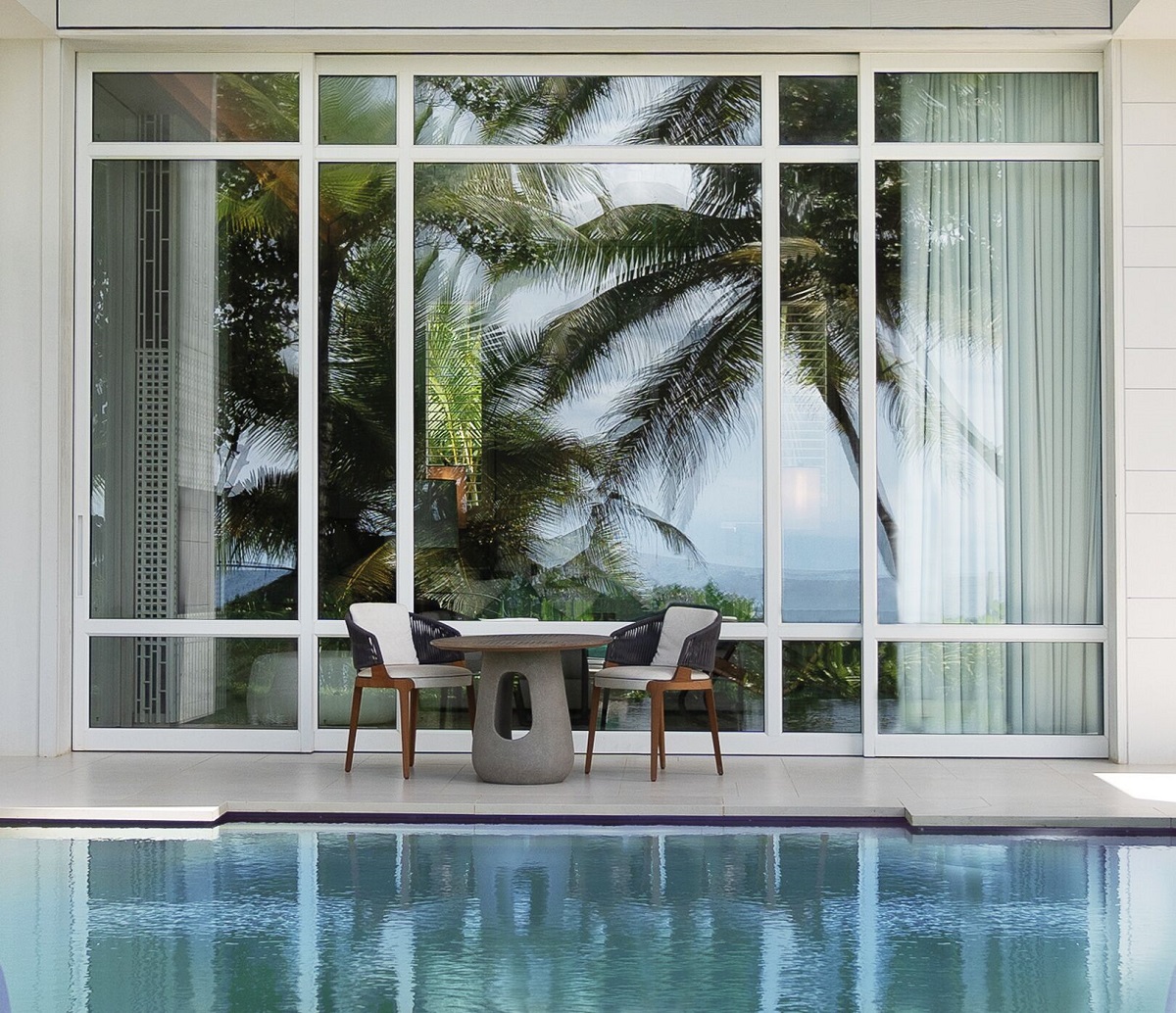 poolside chairs at Cheval Blanc Seychelles