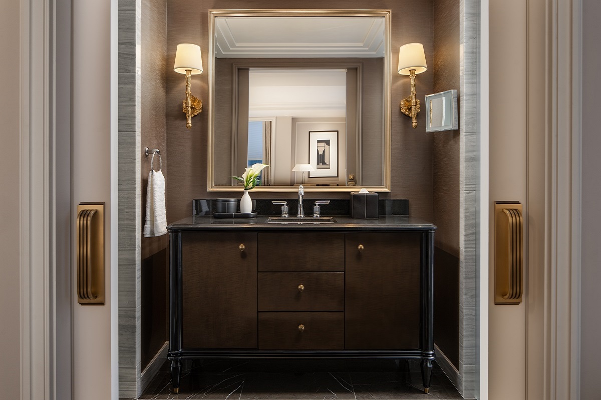 view through doors into ensuite bathroom in Waldorf Astoria New York