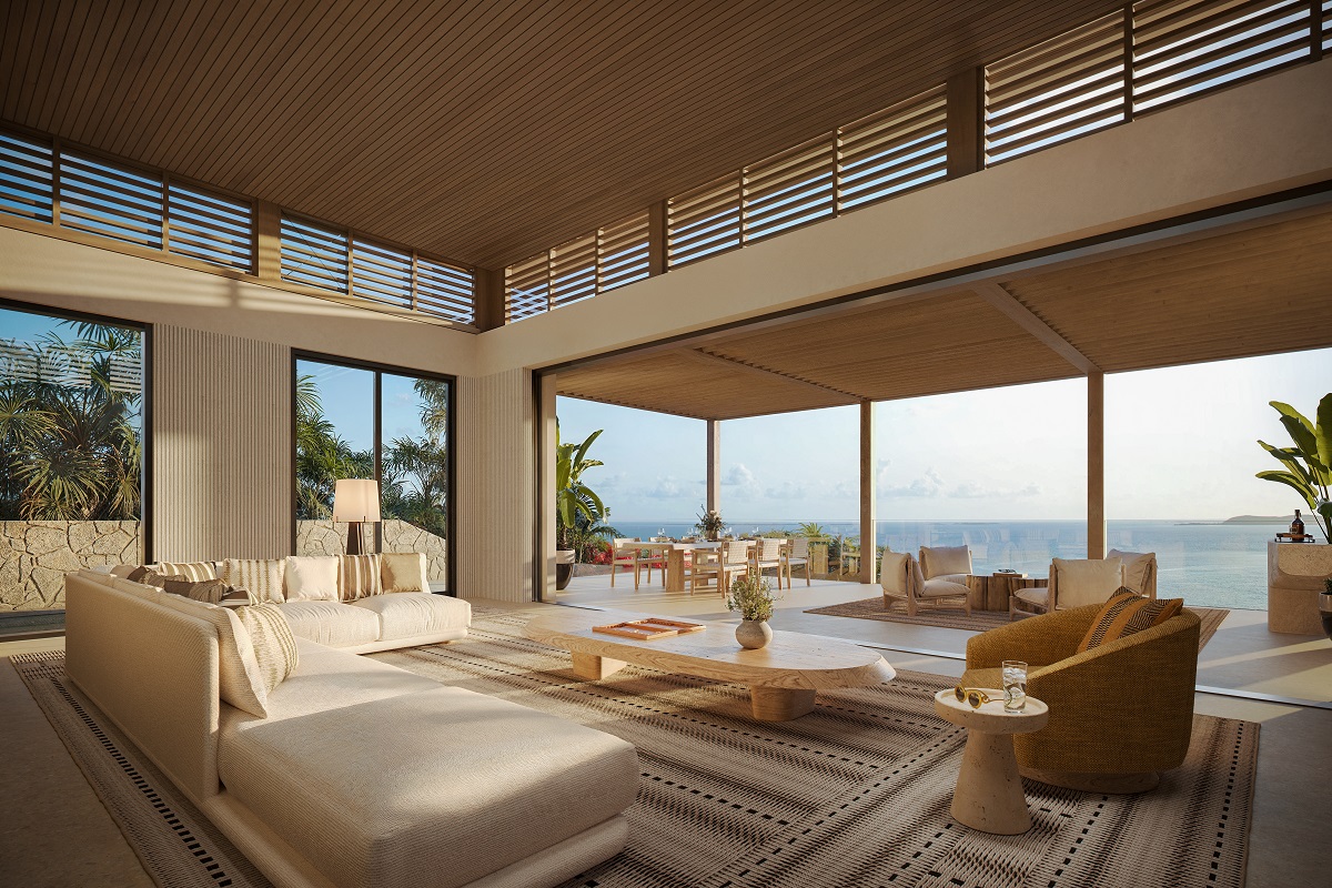 seating in lounge in Moncayo villa with wrap around glass doors and private deck