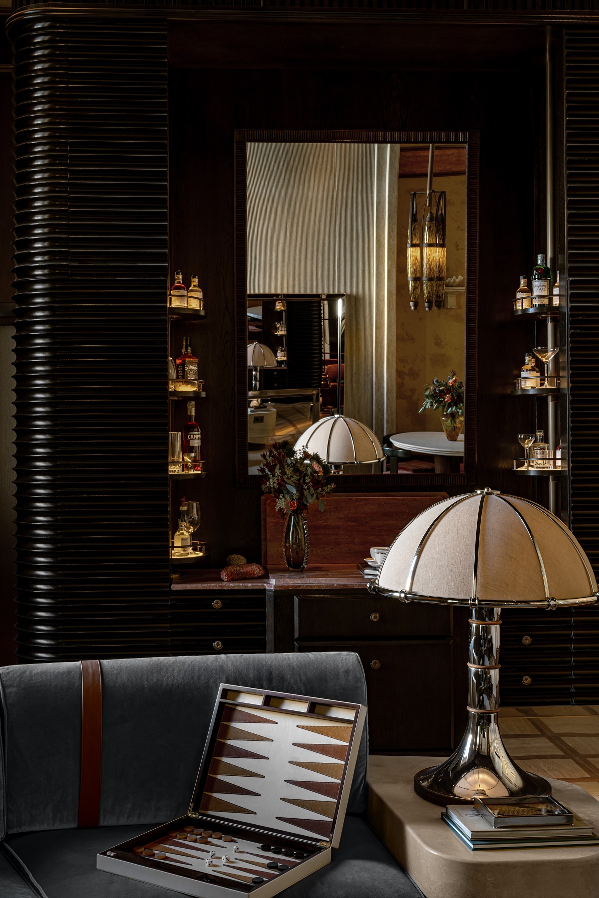 backgammon board and bespoke lighting in the living room of La Minerva Orient Express