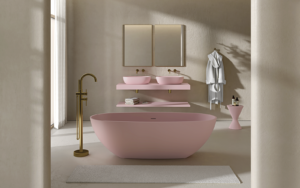 pink freestanding bath and basin with brass fittings in cream bathroom room set