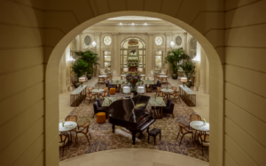 view through arch onto the grand staircase in Corinthia Brussels