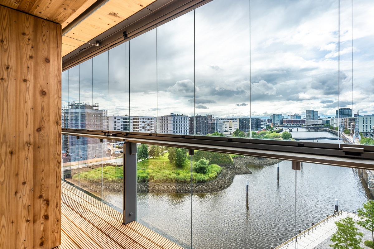 view through wooden framed window onto water at ROOTS Hamburg