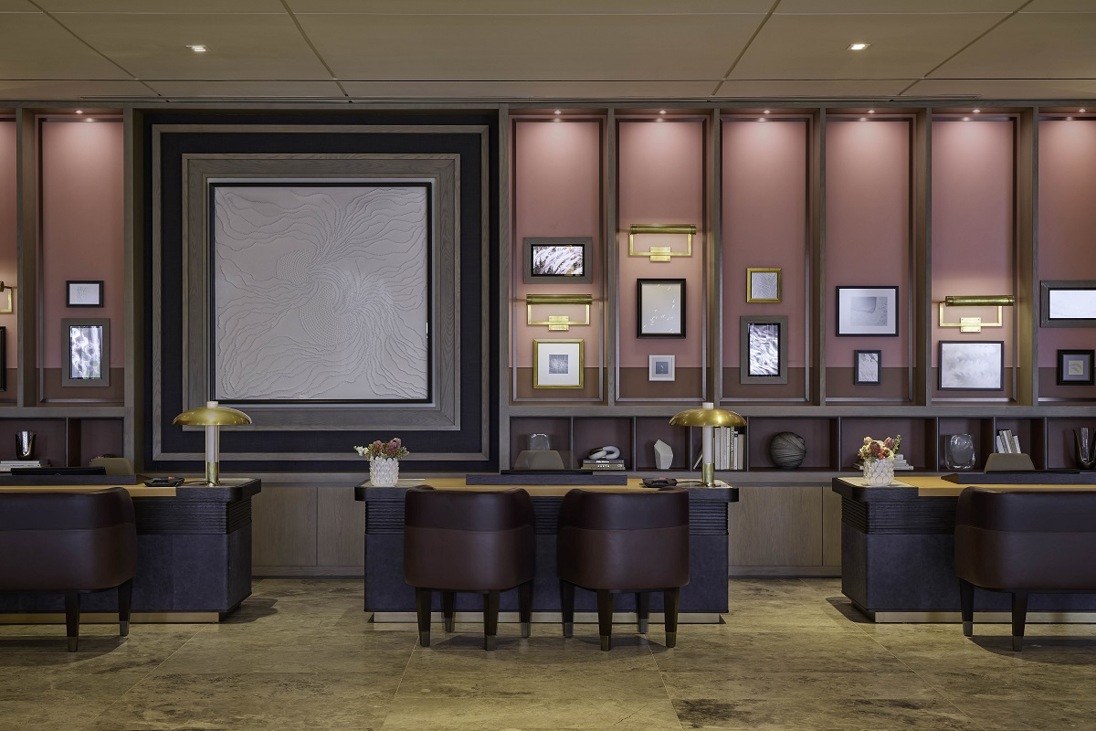 leather chairs and backlit shelving in reception area of The St. Regis Longboat Key Resort