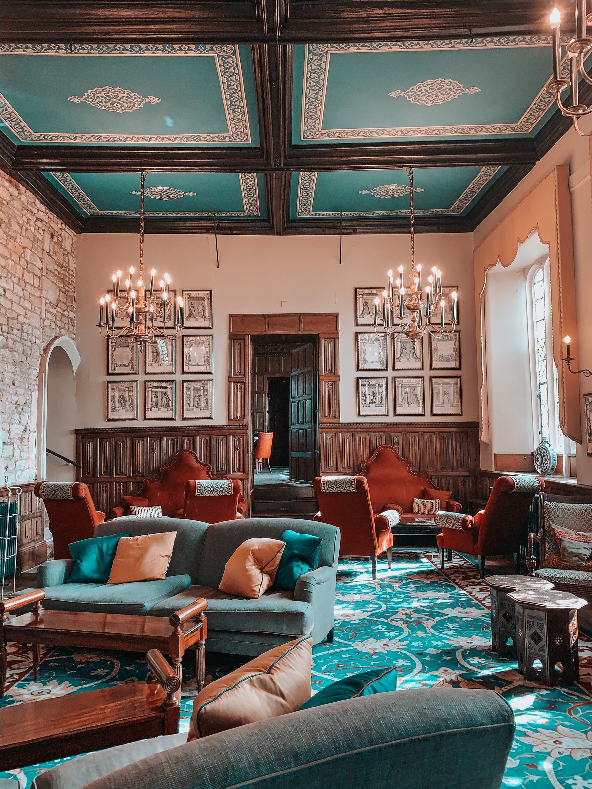 teal blue and orange accents in hotel lounge at Ellenborough Park Hotel