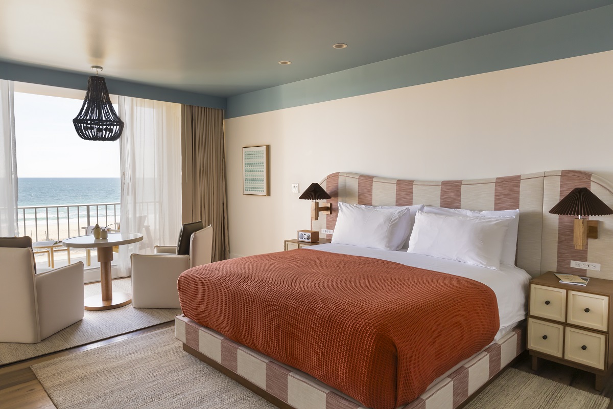 sand and sea coloured soft furnishings in guestroom with seaview