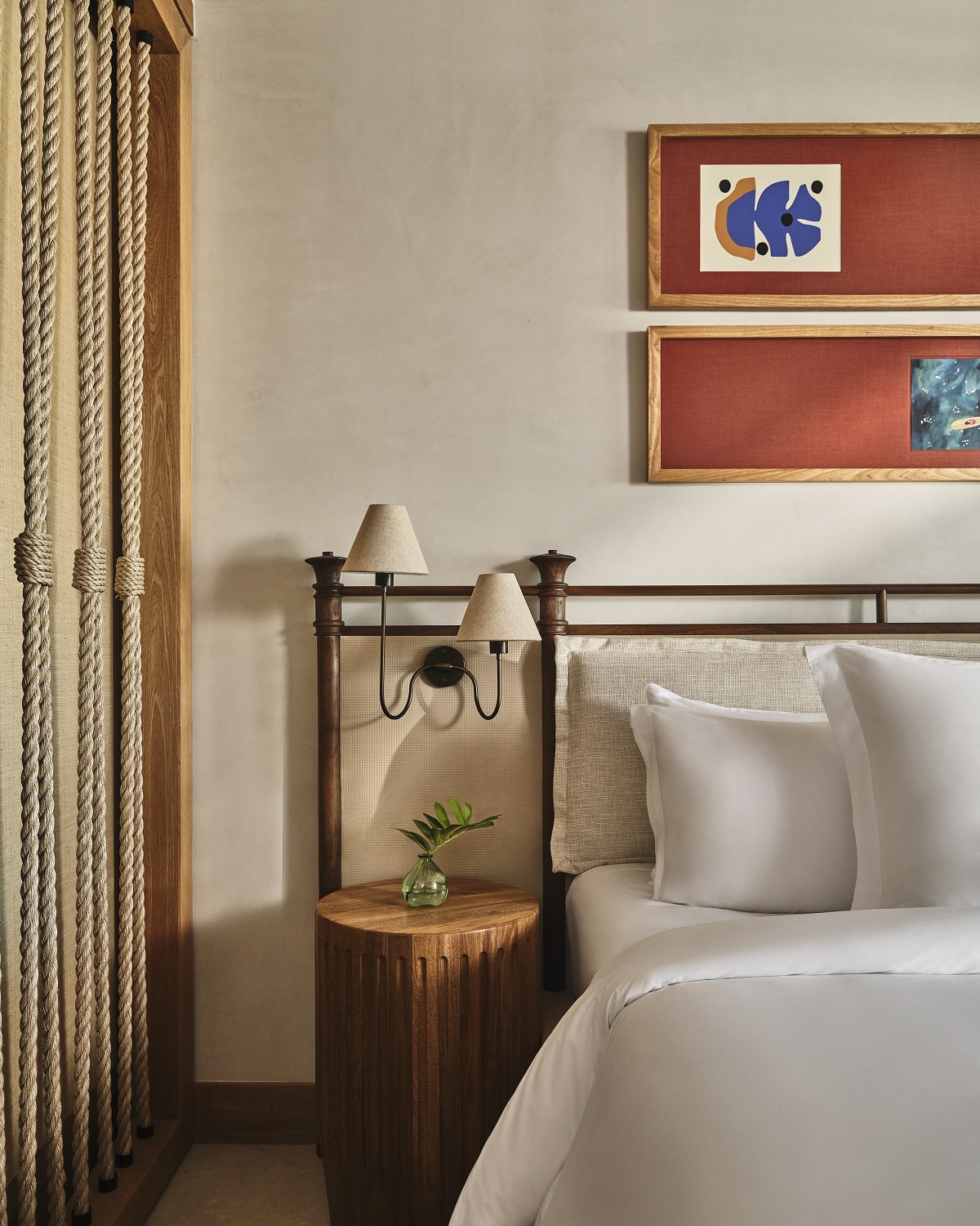 detail of bed and knotted rope screen in Four Seasons Cabo guestroom