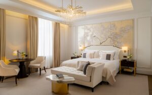 gold, cream and white design in guestroom of Corinthia Grand Hotel du Boulevard Bucharest