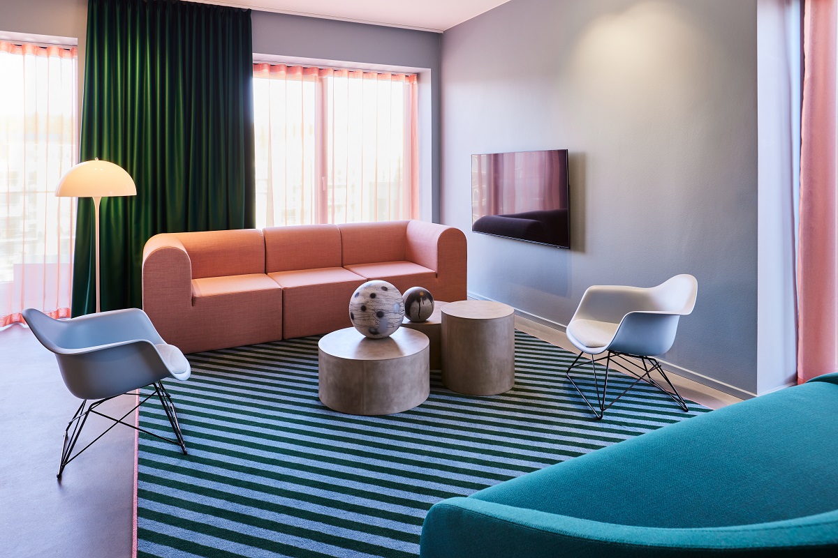 black and white striped carpet with scandi style furniture