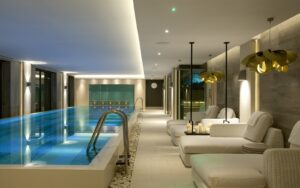 Dormy House spa with raised pool and loungers