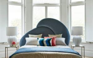 sofa.com's teal Harmony bedframe infront of bay window