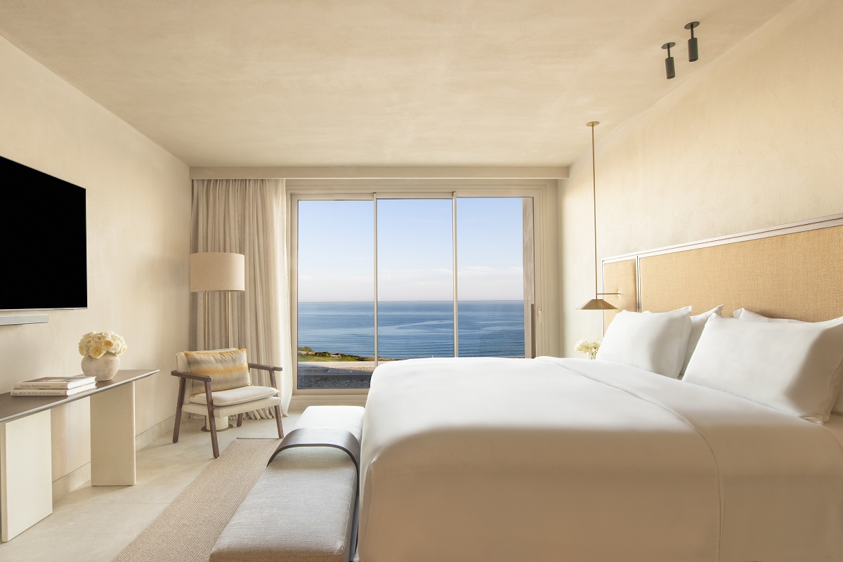 white and cream guestroom design in Fairmont La Hacienda