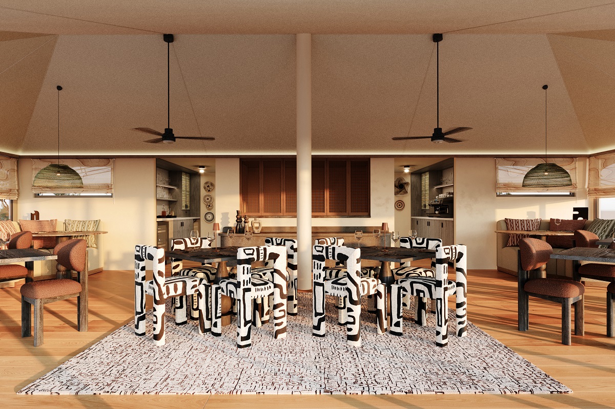 black and white chairs under ceiling fans in tented dining room