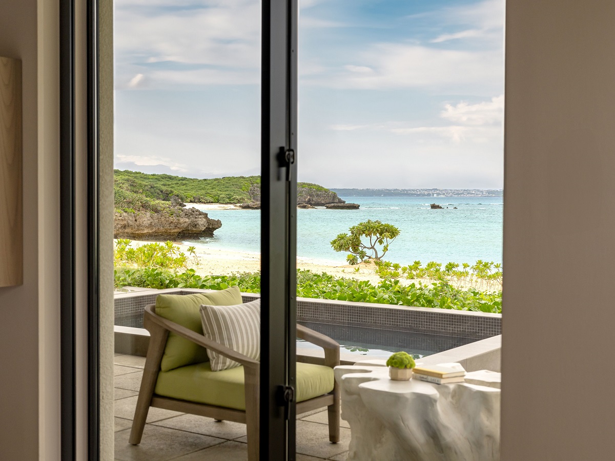 view from guestroom in Rosewood Miyakojima to private terrace and pool with island view