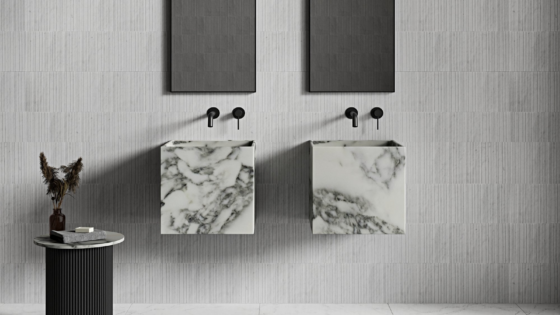 double wall-hung marble basins from Nôsa in the OpusArtis™ Marble Collection