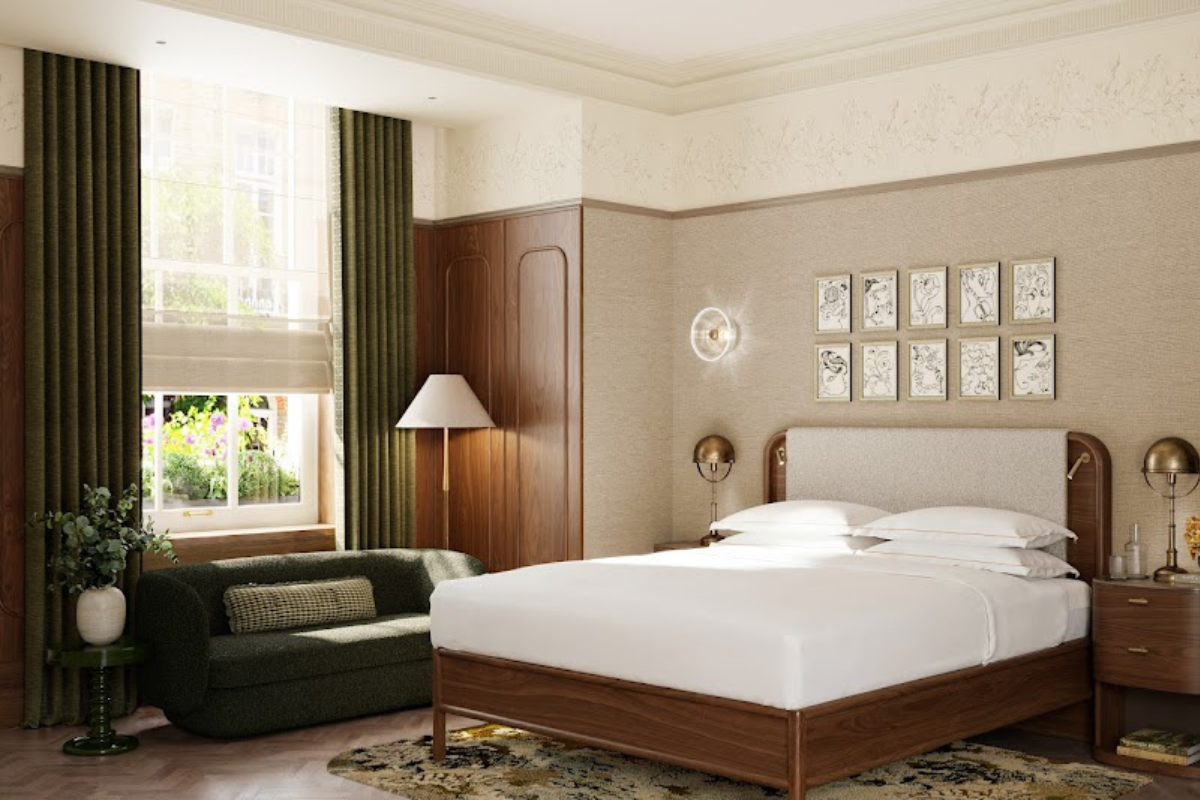 Render of a ground floor bedroom in the Botanical Suite of the Montcalm Mayfair. Soft beige walls, curved headboard bed and green curtains form the decor