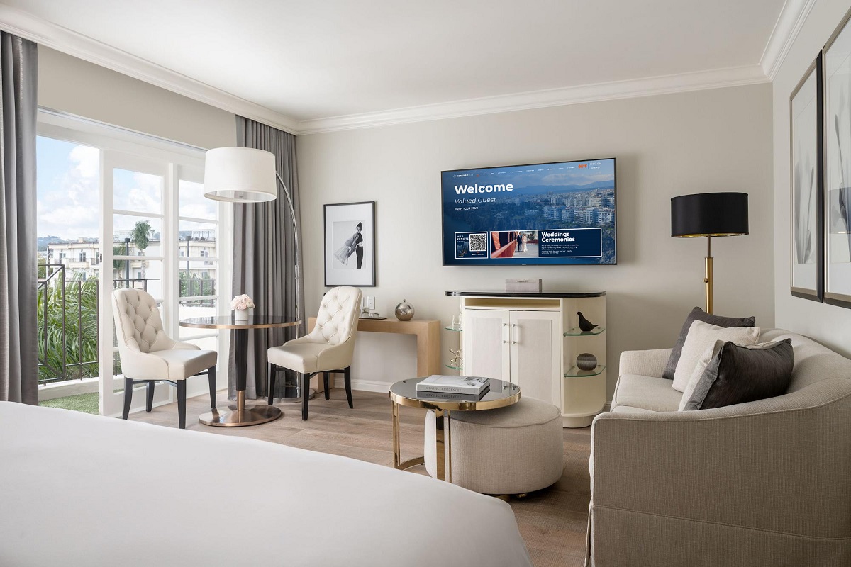 hotel room with television showcasing WorldVue Hub