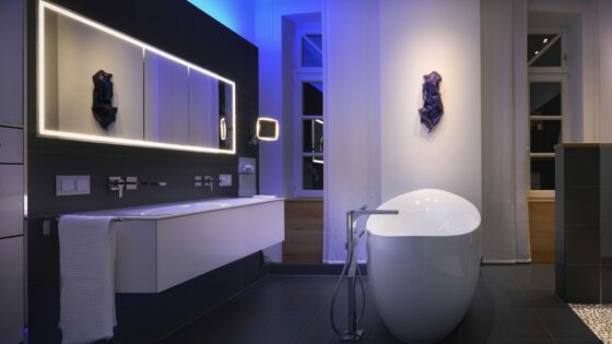 Blue-lit bathroom by Schluter-Systems