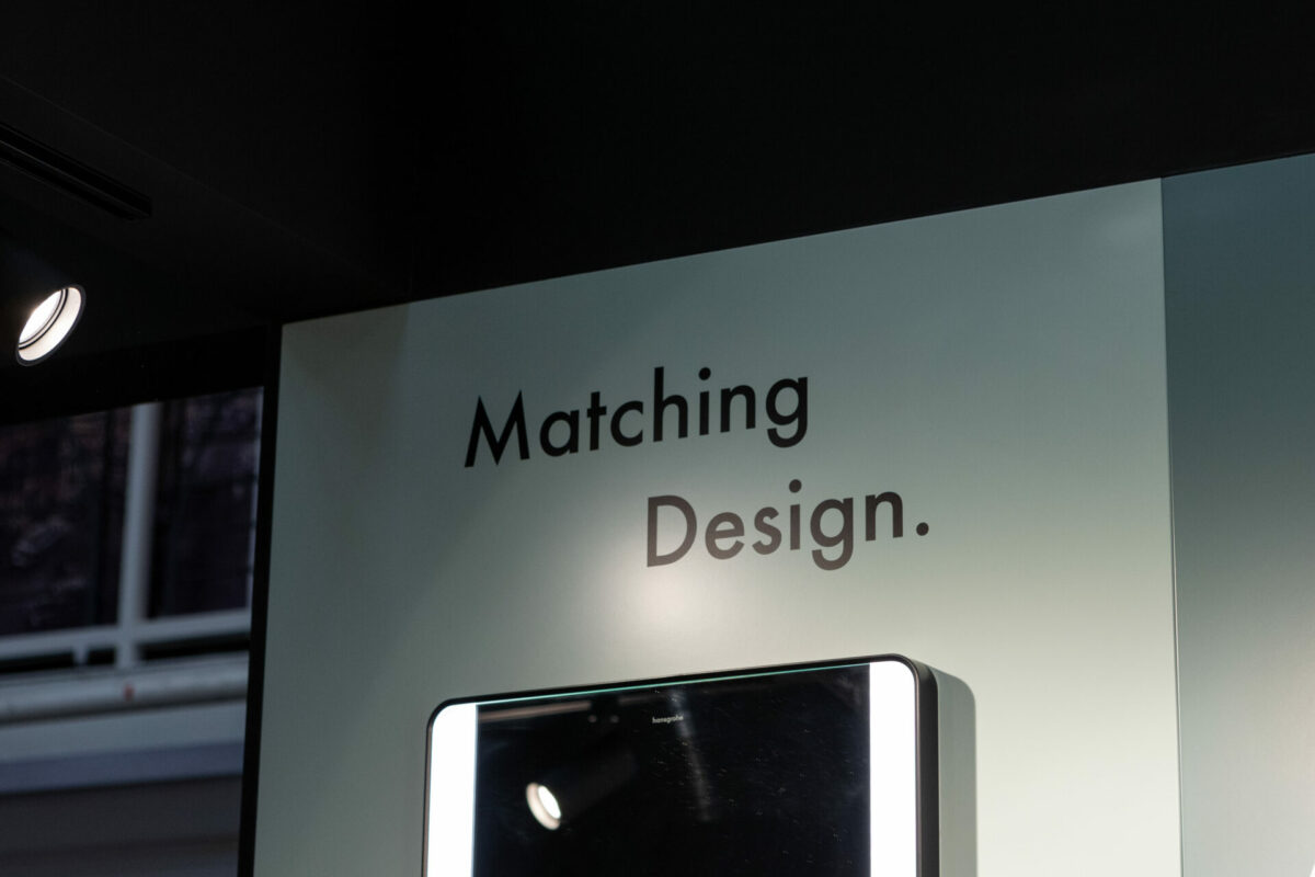 'matching design' quote on the wall of the hansgrohe stand at HIX 2024