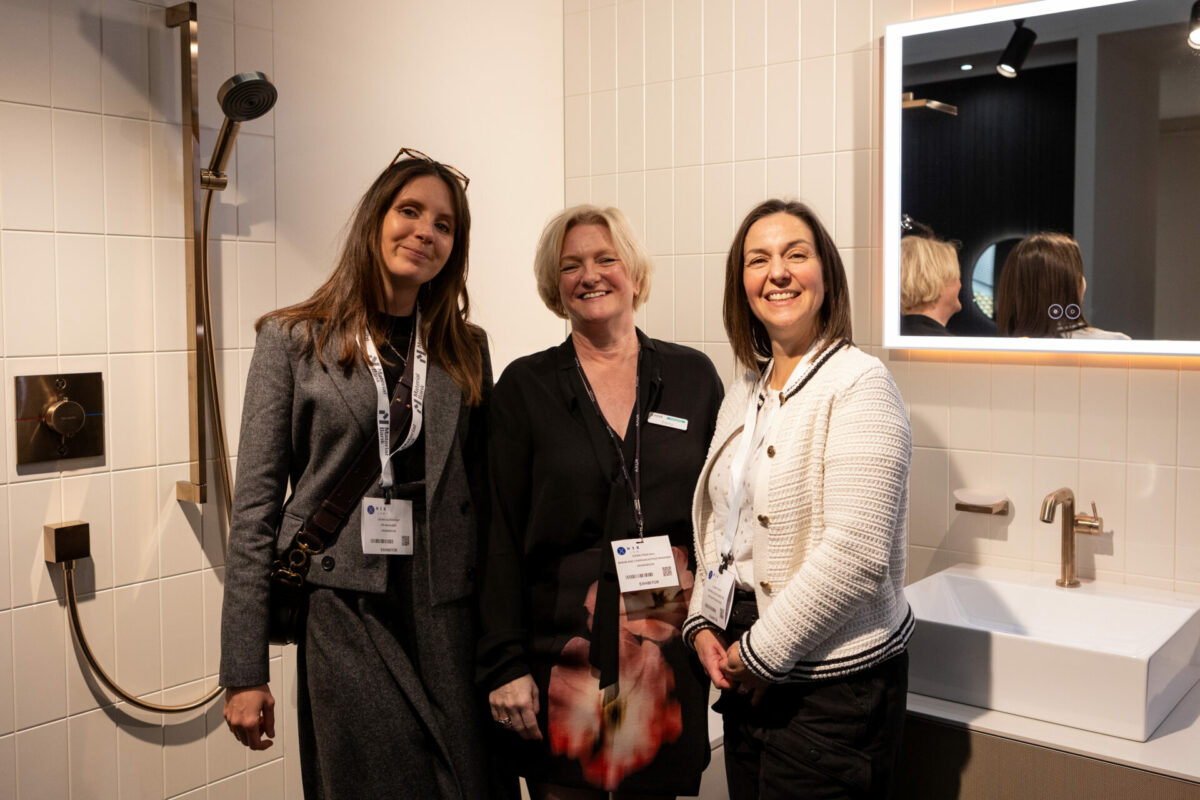 3 ladies stood on the hansgrohe stand at HIX 2024