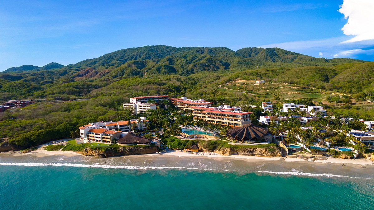 view from the sea across to Armony_Marival_Resort_Spa_-MGallery_Collection-