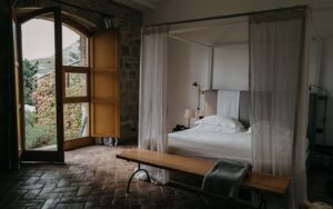 suite in susafa hotel in sicily with windows opening onto the countryside