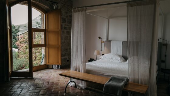 suite in susafa hotel in sicily with windows opening onto the countryside