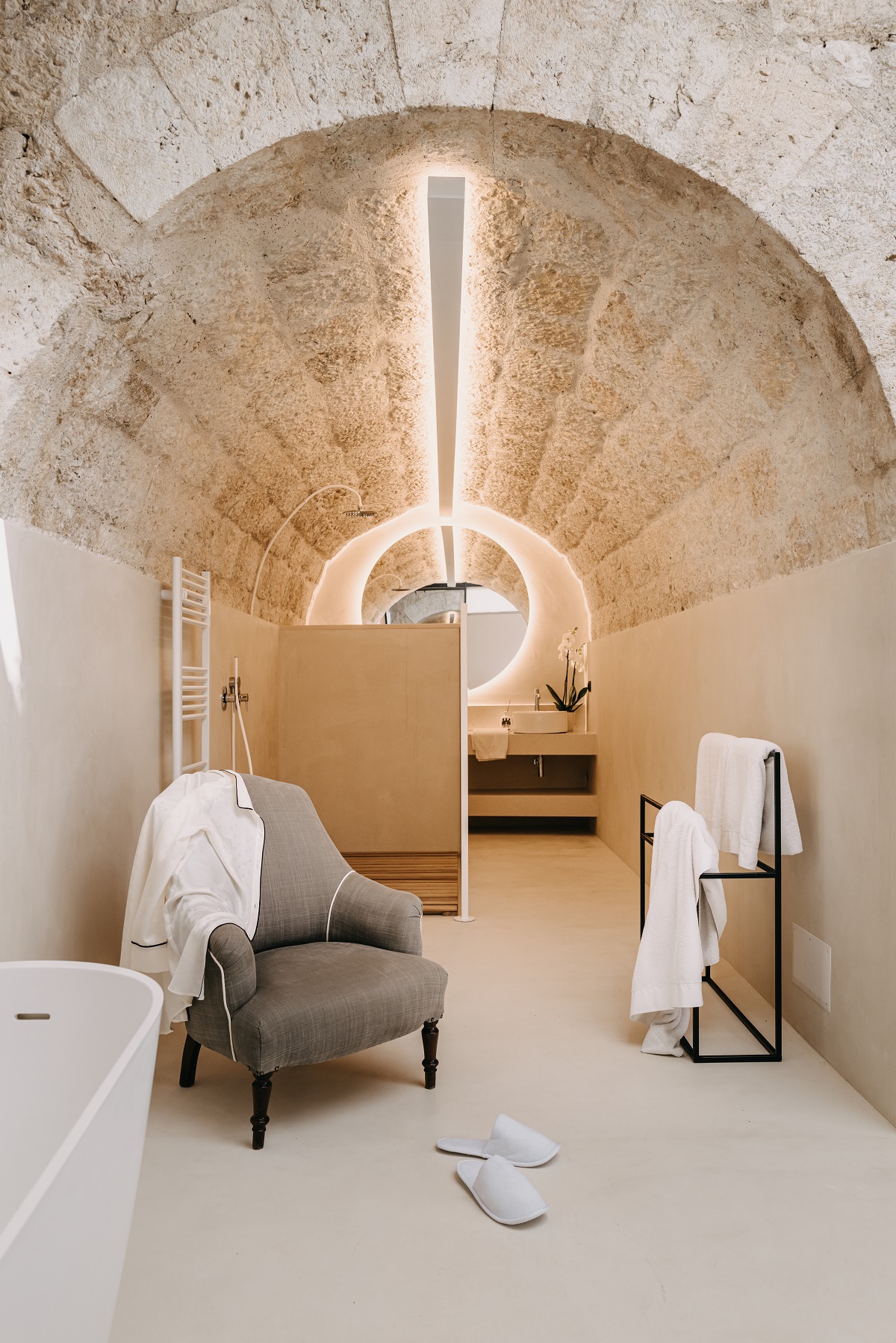 vaulted stone ceiling in ensuite bathroom in traditional masseria hotel