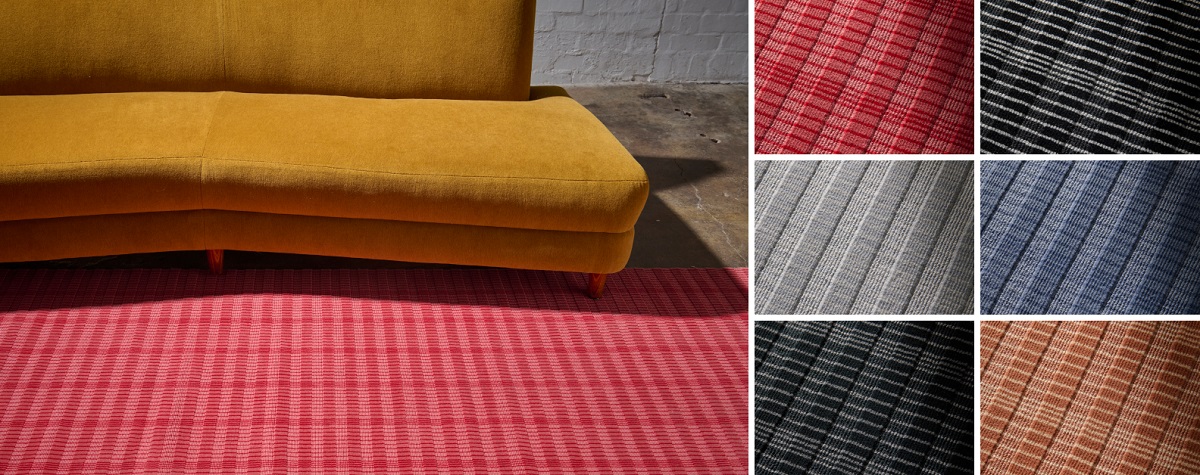 yellow couch and red carpet alongside carpet sample colours