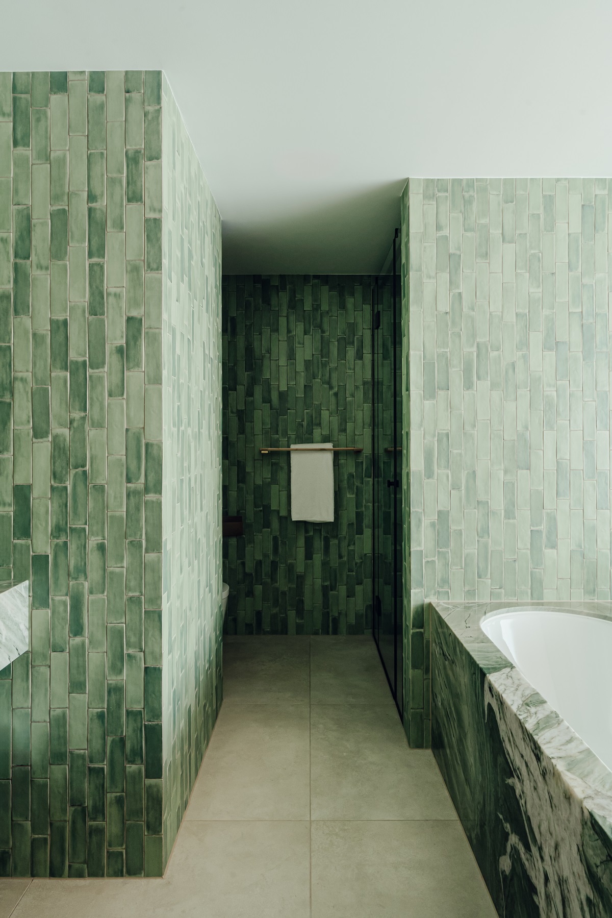 green tiled bathroom in PURO Poznan
