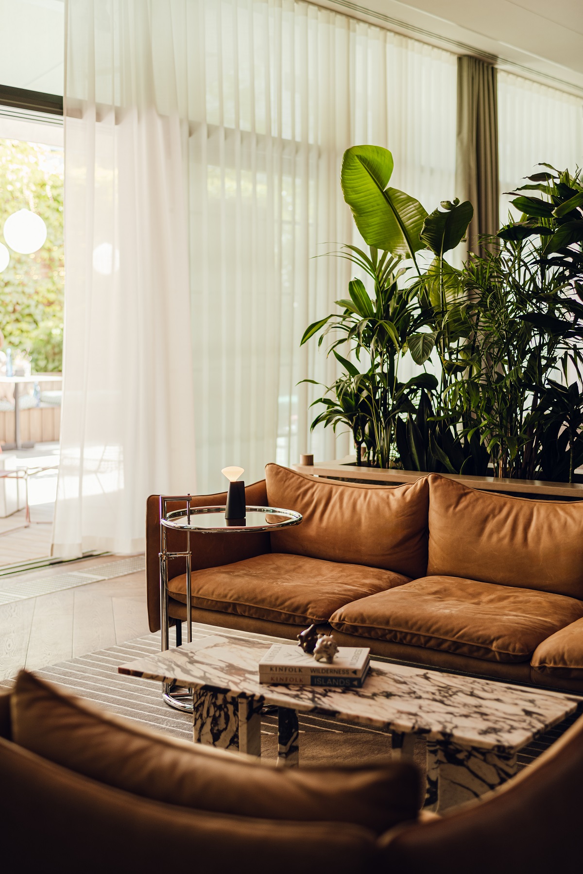 Holloway Li sofa and Eileen Gray table