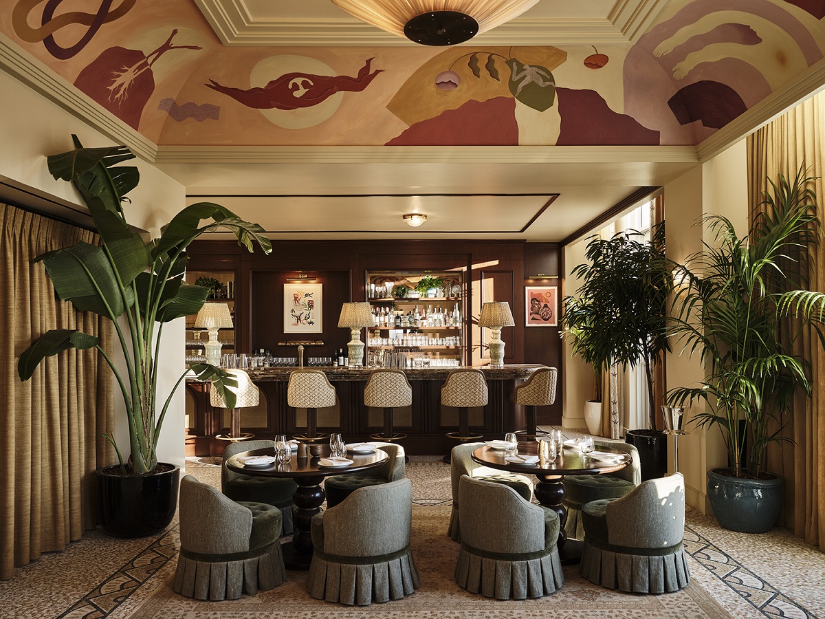 painted ceiling , palm trees and chairs in The Ned Washington DC